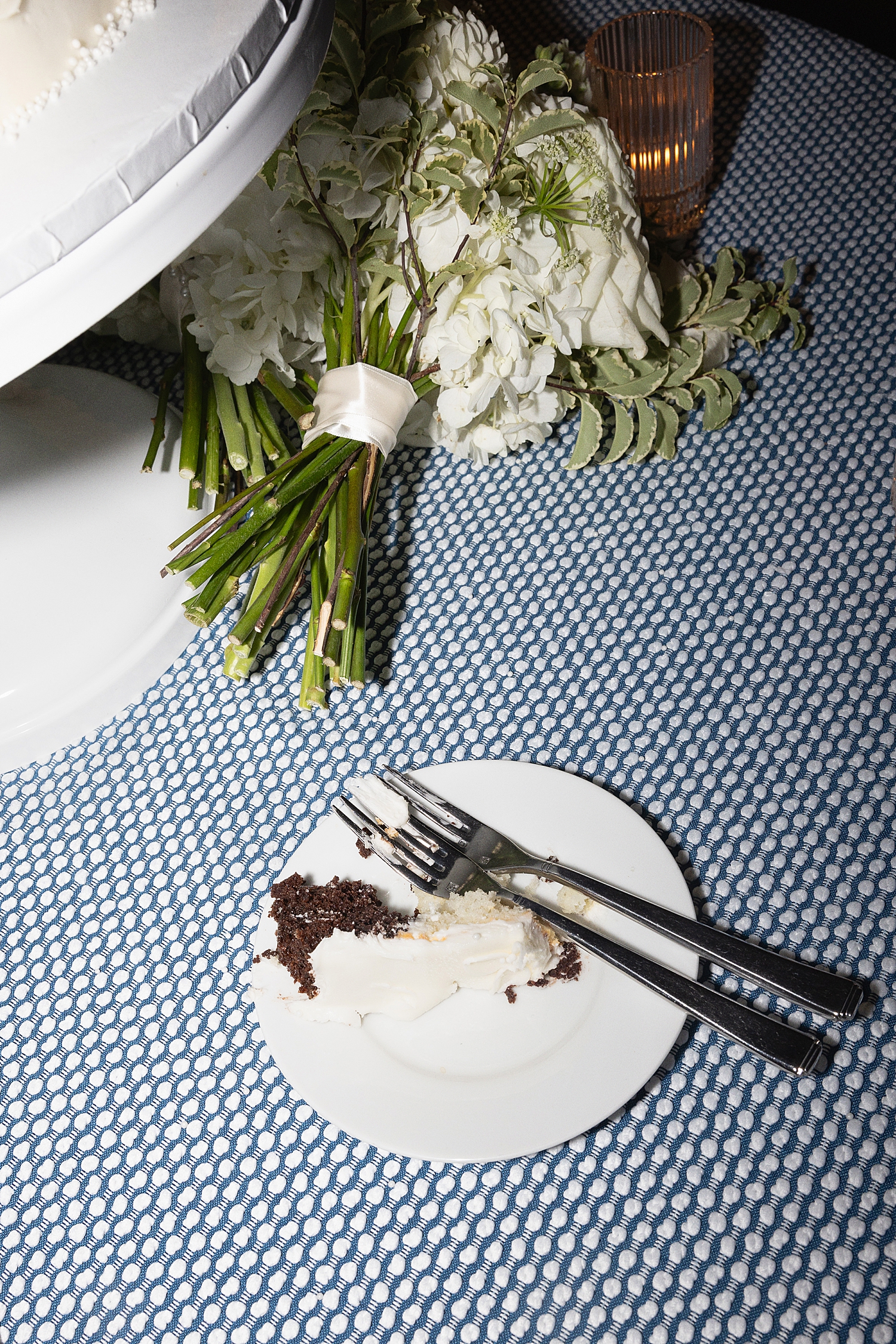 half eaten cake abandoned for more dancing by Cape Cod wedding photographer