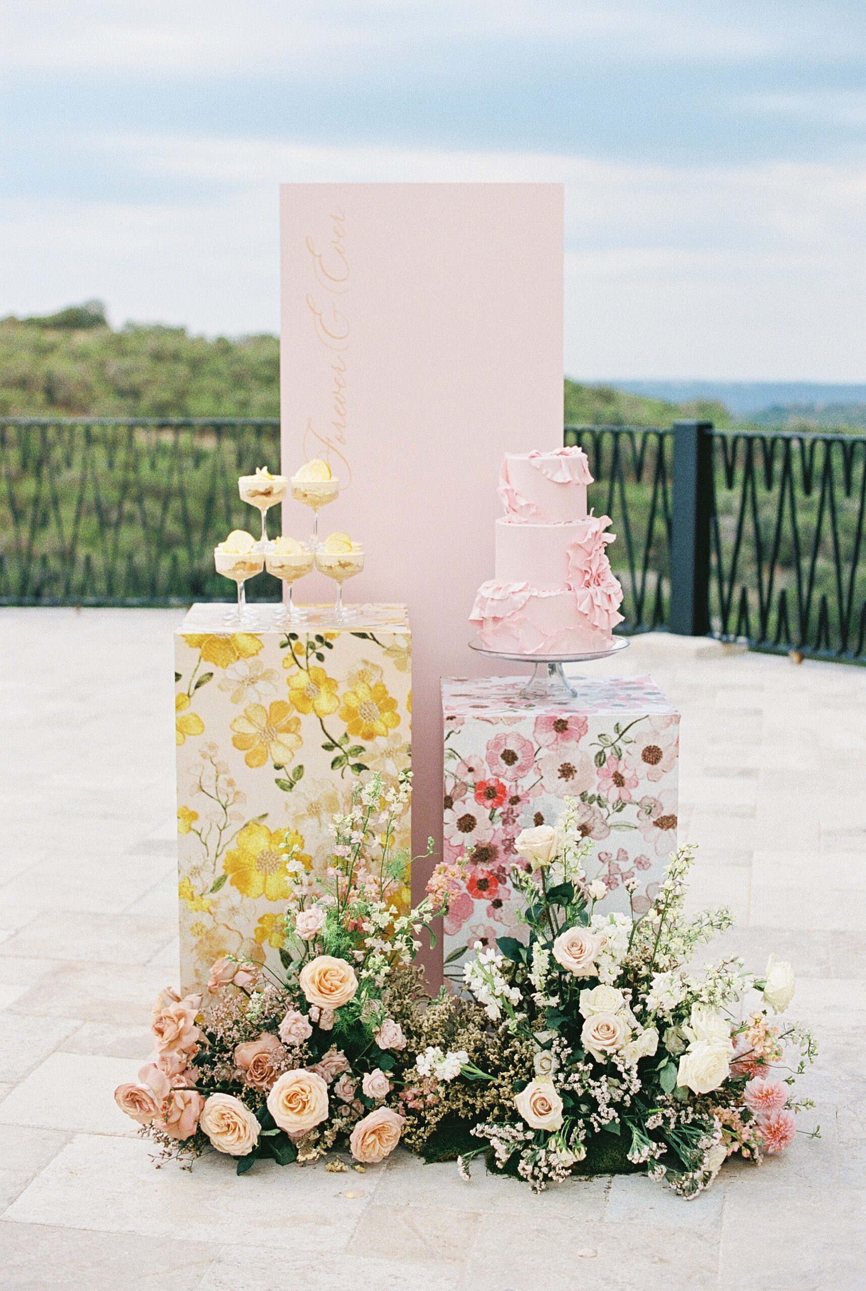 Cake and dessert station at Villa Antonia wedding editorial