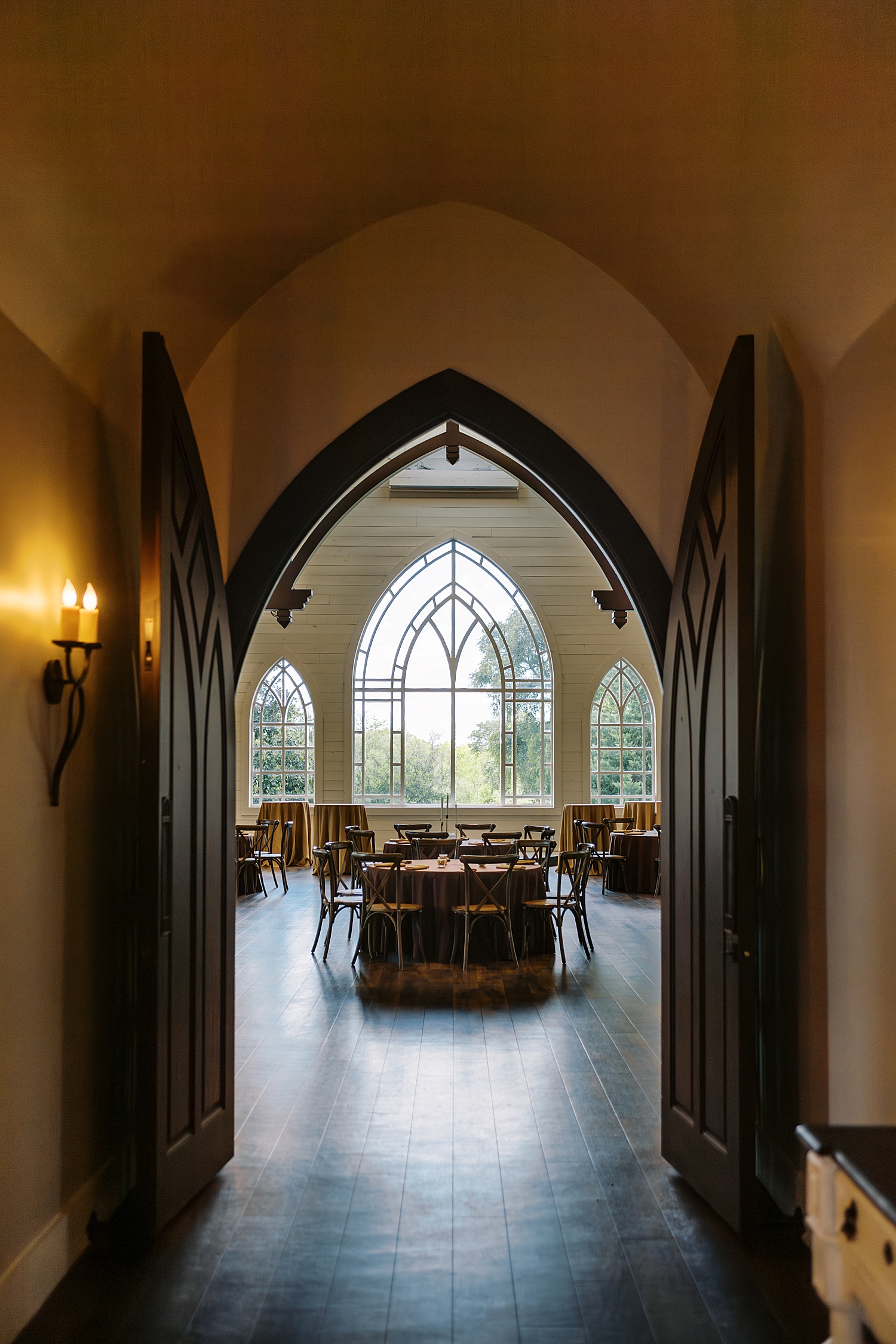 old church style door leading into reception hall at HighPointe Estate