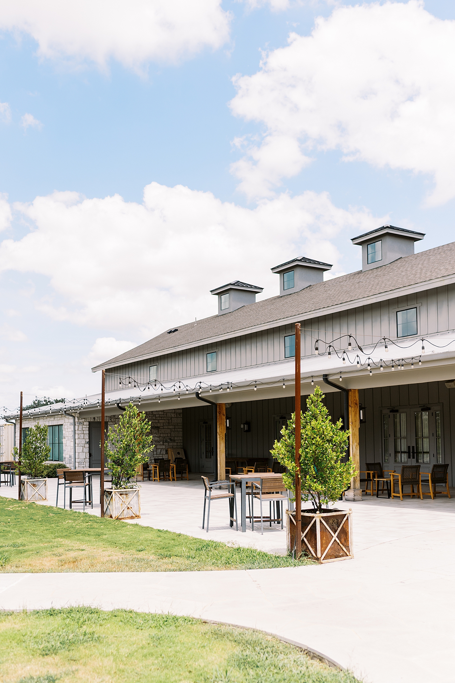 outdoor courtyard under twinkle lights by Austin wedding photographer