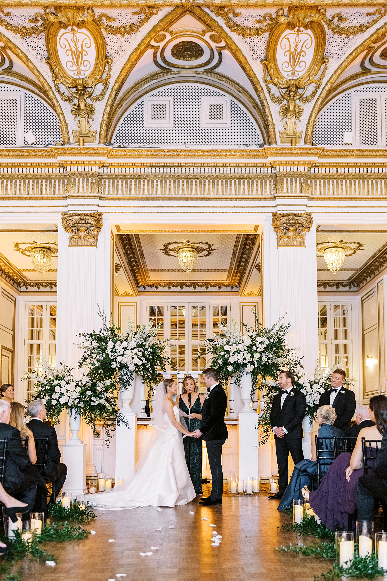 couple stand at ornate alter in Fairmont by Lynne Reznick Photography