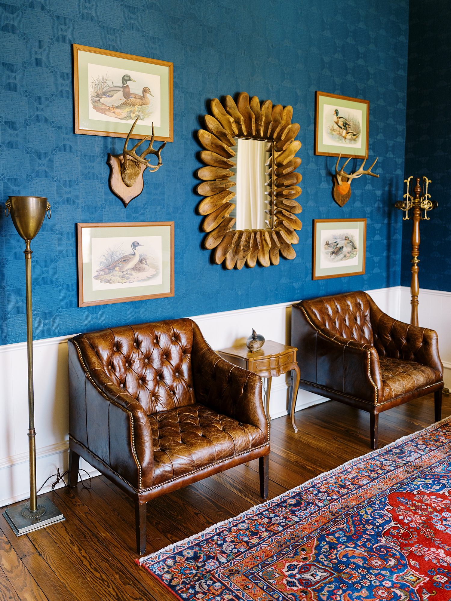 vintage inspired room with blue walls in venue by Lynne Reznick Photography 