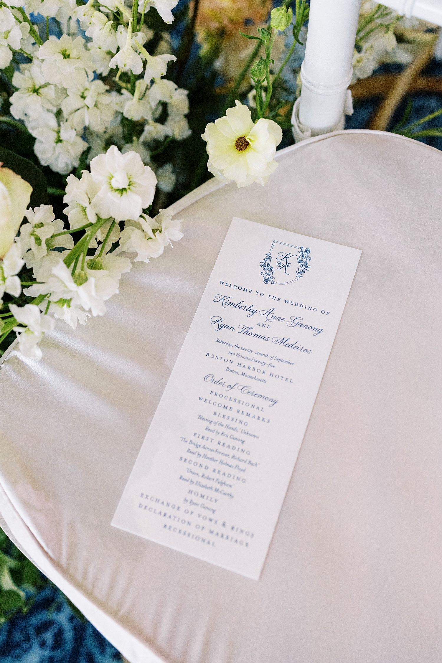program sits on ceremony seat by Lynne Reznick Photography